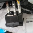 Remove two allen screws from pwer socket and remove to gain access to switch Ender 3 V2 power switch mod