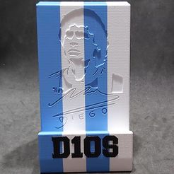 129330297_423402229041960_3093606953329580009_o.jpg Free STL file Cell Phone Holder in Honor of Diego Maradona・3D printer design to download