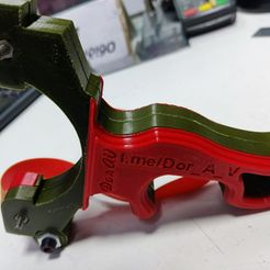 photo_5350753197926501276_y.jpg Slingshot with laser sight