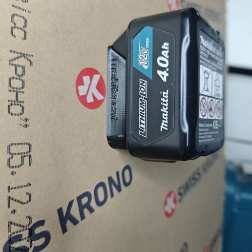 0-02-05-081172da8286d94944b9e4a7d97e0061791e6a3549dd38619c7328cfa375e974_35202a8731cbc7ab.jpg Porte-batterie Makita CXT