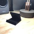 pic2.jpeg Quick and easy to print phone cradle / stand for your desk.
