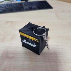 20220516_151457.jpg Marshall Amplification inspired keyring that holds an actual bluetooth speaker!