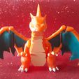 Imagen-de-WhatsApp-2024-08-26-a-las-17.06.16_e76724cf.jpg Mega Charizard Y articulated - flexible