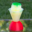 346871ba467ba76e4a6399b749a1d44c_display_large.jpg Snow Cone Molds and Cups