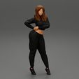 Girl-0001.jpg Mujer joven de pie con ropa deportiva