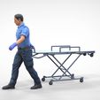 AW1-1.1.15.jpg N1 Ambulance worker pulling wheeled stretcher or trolley