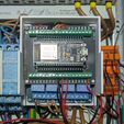 PXL_20251217_151659697.jpg DIN rail housing 4 channel relay + ESP32 development board