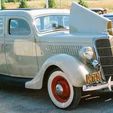 1935_Ford_Model_48_730_De_Luxe_Fordor_Touring_Sedan_4M7628.jpg Ford V8 Fordor Deluxe Sedan 1935