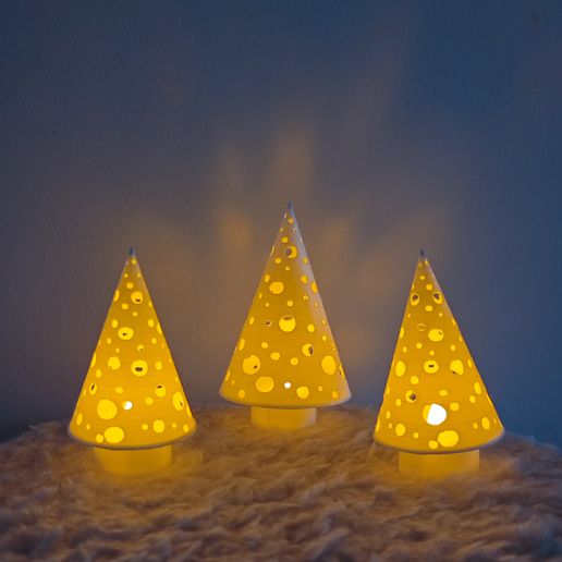 1730967425372.jpg Christmas tree candles (cones)