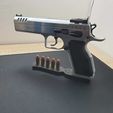 WhatsApp-Image-2023-11-21-at-12.30.58.jpeg Support de pistolet type court - avec trous pour balles