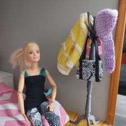 20220812_183215_HDR.jpg Barbie coat rack