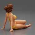 3DG-0003.jpg Femme sexy assise en bikini sur la plage