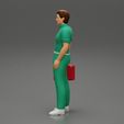 3DG-0005.jpg paramedic Standing And Holding first Aid box