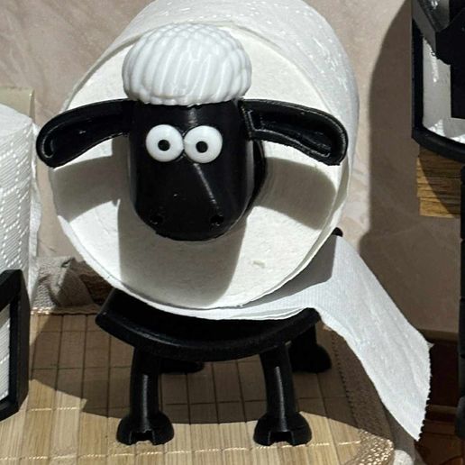 d9acc435-0357-410a-9d59-c4f896858ed1.jpg Sheep toilet paper holder with a pulling function