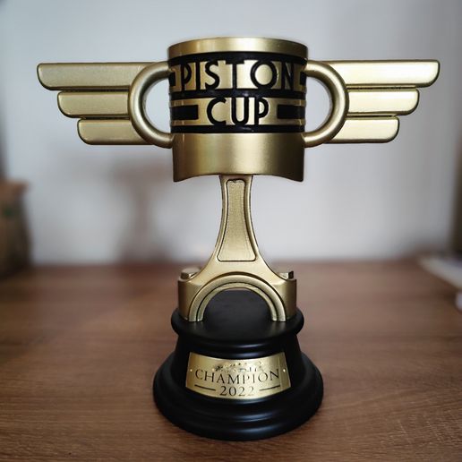 1000005961.jpg CARS movie Piston Cup trophy