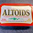 85cd877d-08a7-4550-a7fd-4a290a368c62.jpg Porte-pilules en étain Altoids