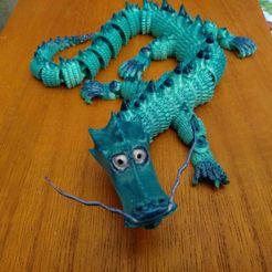 IMG_20230310_143521.jpg Free STL file Chinese articulated dragon・Object to download and to 3D print