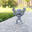 196b8fe8-5703-4a8f-97b0-812a1018cd22.jpg “Hands-Up Screamer” - Cartoon Zombie