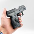 IMG_4235.jpg Pistol Taurus G2C Prop practice training fake training gun
