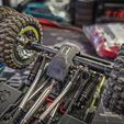20250515_143836.jpg OFFROAD ADDICTION SCX24 STOCK AXLE SHOCK DIFF SKID SHORT