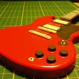 100_8049.jpg Gibson Sg mini guitar model