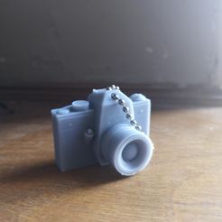 processed-419788e1-2b56-4e9f-beb4-8afed07c3f76_wn4JxZwr.jpeg STL file Camera Charm・3D printer design to download