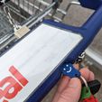 PXL_20231012_135452861.jpg Mini shopping chip shopping cart release key fob smiley shopping cart
