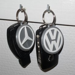 426111d9b08b877c596a596988771c02_display_large.jpg Mercedes Benz and Volkswagen keychain