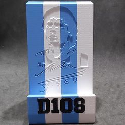 129330297_423402229041960_3093606953329580009_o.jpg Free STL file Cell Phone Support in Honor of Diego Maradona・3D print design to download, Qv2Printing