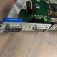05.jpg Amiga 1200 Mainboard mounting clips & mouse mounting