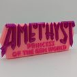 PXL_20240723_164356527.jpg Ametista - logótipo de banda desenhada