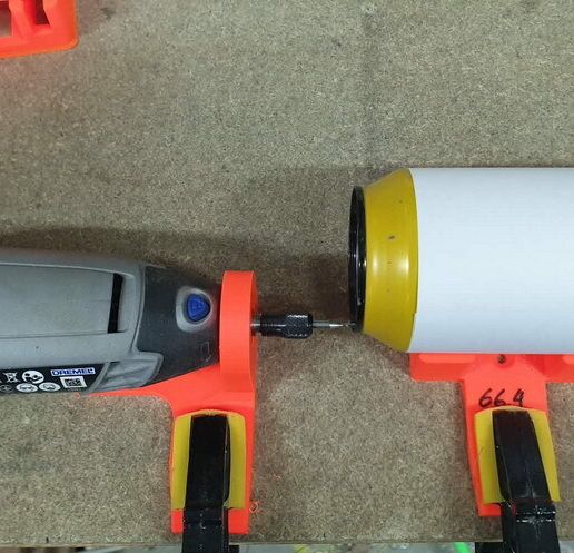 canTool_how_to_use_r.jpg Supports for cutting can lids with a Dremel tool
