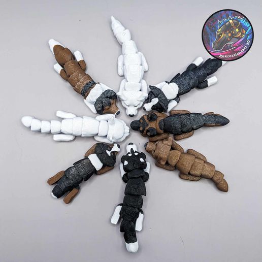 393072690_377411088068657_6844277221211307145_n.jpg Baby Dog and Cat Flexi Keychains (Set of 8.)
