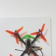 image.png Drone racing wall mount holder with betaflight logo