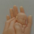 BPR_Composite.jpg baby in two hands