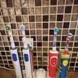 1640858079556.jpg Support 4 electric toothbrushes + a charger + 4 toothpaste tubes