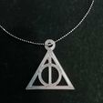 f90cc94e-1eee-4dd2-b4ef-7729c2b833d6.jpg Reliquias de la muerte, the Deathly Hallows necklace