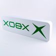 IMG_20230515_175602.jpg Xbox display piece and magnet sign.