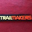fa1ed1cf-5f90-430f-b375-dfc1aaaac469.jpeg TrailMakers Game Logo Sign