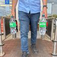IMG_1240.jpg Bottle Buddy: Universal Soda Bottle Carrier with Ergonomic Handle & Magnetic Storage – Fits Most 1L to 2L Bottles Worldwide