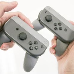 IMG_5525.jpg Nintendo Switch Single Joy-Con Grip + и -