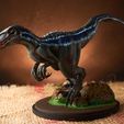 a Jurassic world, Velociraptor, dinosaur with a watchful pose