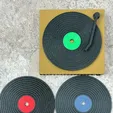 img_3590.webp Conjunto de base para discos de vinil e expositor