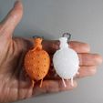 On hand.jpg STL file Baby Turtle Ship Keychain Accessory・Template to download and 3D print