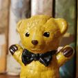 20241219_140828.jpg Cute sitting teddy bear figure.
