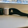 20240121_120726.jpg fixing the legs for the artificial Christmas tree.