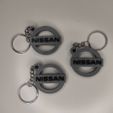 IMG_20220208_201433.jpg Nissan logo keychain