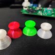 thumbstick.jpg Capuchon de manche à balai