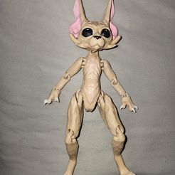 Juguete articulado de peluche: esfinge/gato alienígena