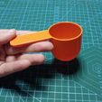 Imagen-de-WhatsApp-2023-04-12-a-las-10.24.28a.jpg Paw print container with spoon - Paw print container with dosifier spoon
